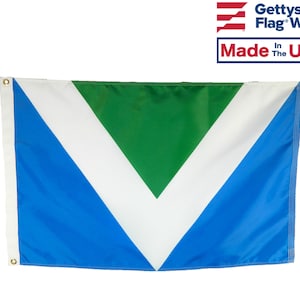 May include: A green, white, and blue flag with a triangular design. The flag is made in the USA by Gettysburg Flag Works.
