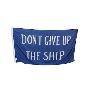 May include: A blue flag with white text that reads "DON'T GIVE UP THE SHIP".