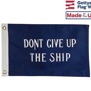 May include: A blue nautical flag with white text that reads "Don't Give Up The Ship".