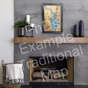 May include: A wooden map of Lake Norman, North Carolina, with a blue water inlay. The map is framed in black and displayed on a mantel above a fireplace.
