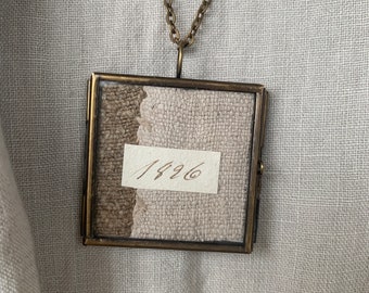 Framed Pendant/Antique Quilt/ Old script paper/chain