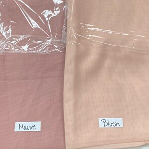 May include: Two fabric swatches, one mauve and one blush, labeled with their respective colors.