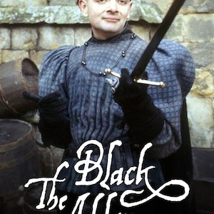 May include: A person wearing a grey textured doublet with puffed sleeves and a black beaded necklace, holding a sword. The text "The Black Adder" is printed in white in the foreground. The attire features a high collar and dark gloves.