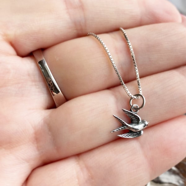 Swallow necklace meaning clearance