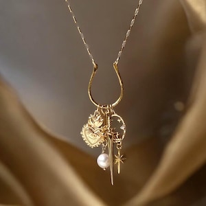 Gold Sacred Heart Sword Charm Necklace: Celestial Jewelry