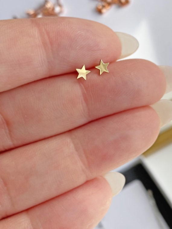 Gold star studs deals