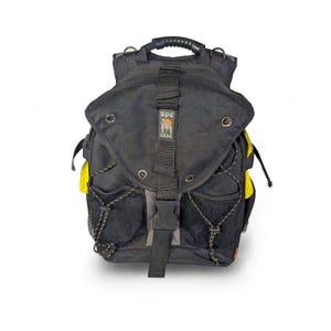 May include: A black backpack with yellow side panels, featuring a top handle, a front flap with a buckle closure, and a central patch displaying the text Ape Case with a gorilla icon. The bag includes two black mesh pockets and bungee cords.