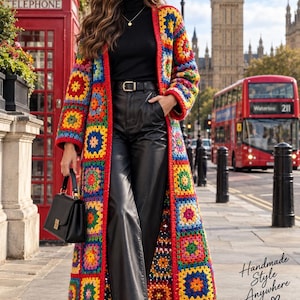 May include: A long, open-front crochet cardigan featuring a vibrant, multi-coloured granny square pattern in red, blue, yellow, and green. The garment is worn over a black turtleneck, black leather trousers, and a black handbag. Text reads: Handmade Style Anywhere, LONDON VIBES.