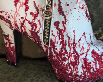 Zapatos de arrastre sangrientos