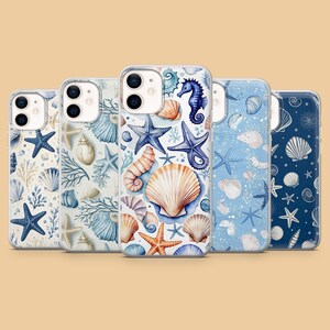 May include: Five smartphone cases arranged in a row, each featuring a unique watercolor-style pattern of seashells, starfish, and seahorses in various shades of blue, white, and tan. The designs include detailed illustrations of marine life.