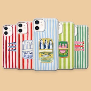 May include: Five smartphone cases featuring vertical stripes in red, white, light blue, lime green, and mint green. Each case displays a graphic illustration of a sardine tin with fish, with some featuring the text SARDINES or POUR LES TOASTS.