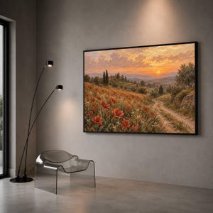 May include: A rectangular landscape painting in a black frame depicting a sunset over a rolling countryside. The scene features a dirt path winding through a field of vibrant red poppies, with distant hills, cypress trees, and a warm orange sky.