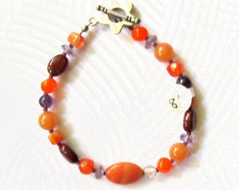 Womens Orange and Purple Beaded Bracelet 8 Inches