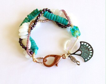 Four Strand White and Teal Beaded Womens Bracelet 8 1/4 Inches