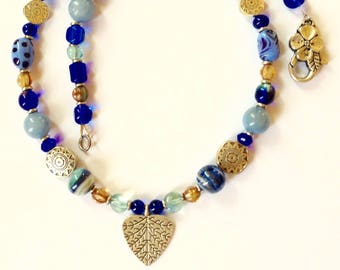 Blue Beaded Necklace With Silver Leaf Pendant 19 1/2 Inches