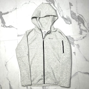 May include: A light gray heathered zip-up hoodie featuring a black front zipper, a hood, and a small black zippered pocket on the left sleeve. The chest area displays the text YPB and Abercrombie, with a small diamond-shaped logo on the right sleeve.
