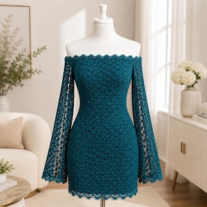 May include: A teal off-the-shoulder mini dress featuring long, flared sleeves and an intricate, all-over floral lace pattern. The garment has a scalloped lace trim along the neckline, sleeve cuffs, and hemline, displayed on a white mannequin.