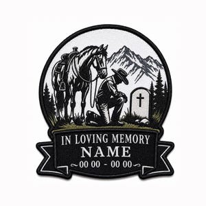 May include: A circular embroidered patch featuring a black and white illustration of a cowboy kneeling beside a horse and a tombstone with a cross. Mountains and trees are in the background. A banner below reads IN LOVING MEMORY NAME 00 00 - 00 00.