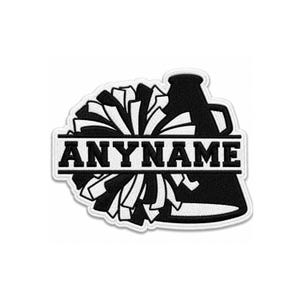 May include: A black and white embroidered patch featuring a cheerleader megaphone and a pom-pom. A horizontal banner across the center contains the text ANYNAME in bold black capital letters, set against a white background with a black border.