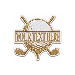 May include: An embroidered patch featuring a white golf ball with a dimpled texture, resting on a tee. Two crossed gold golf clubs are positioned behind the ball. A horizontal gold rectangular banner overlays the centre with the text YOUR TEXT HERE.