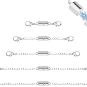 May include: A set of five silver-toned jewelry extenders featuring cylindrical magnetic clasps and lobster claw closures at each end. The extenders vary in chain length, with the top unit having no chain and the bottom unit having the longest chain.