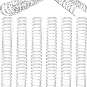 Puede incluir: Una colección de espirales de encuadernación de metal plateado dispuestas en seis columnas verticales, con dos segmentos curvos adicionales colocados horizontalmente en la parte superior. Cada espiral presenta un diseño de doble bucle.