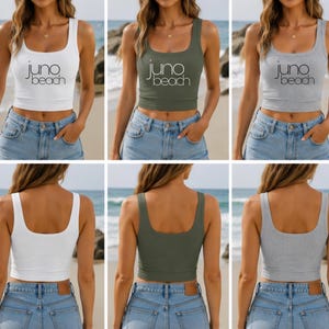 Puede incluir: Una camiseta sin mangas corta con cuello redondo, disponible en blanco, verde oliva y gris jaspeado. La parte delantera presenta el texto 'juno beach' en una fuente negra sin remates. La parte trasera de la camiseta es lisa y de color sólido.