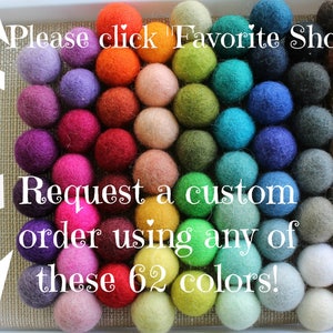 May include: A collection of 62 colorful felt balls arranged in a grid pattern. The text "Please click 'Favorite Shop'" and "Request a custom order using any of these 62 colors!" is visible in the image.