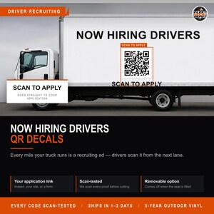 May include: A white box truck featuring a large black text graphic that reads NOW HIRING DRIVERS and a square QR code with the text SCAN TO APPLY. The truck side displays a recruiting advertisement designed for drivers to scan from the next lane.