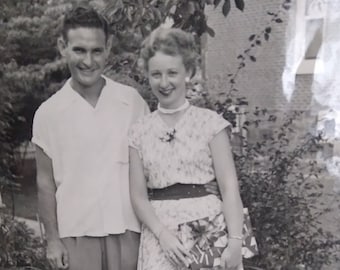 Vintage 8x10 Photograph Young Couple Carrying Gift