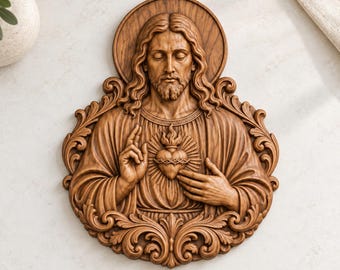 May include: A brown wooden wall plaque featuring a relief carving of the Sacred Heart of Jesus. The figure has long hair, a beard, and a halo, with one hand raised in a blessing gesture and the other pointing to a flaming heart.