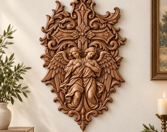 May include: A wall-mounted wooden carving featuring two winged angels positioned in front of an ornate cross. The piece is decorated with intricate scrollwork and floral motifs, finished in a warm, medium-brown wood tone.