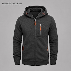 A dark gray zip-up hoodie with orange accents on the zippers and drawstring, featuring a chest pocket and two side pockets.