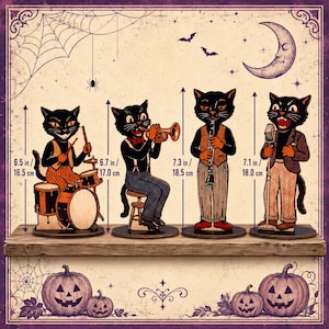 May include: Four black cat figures dressed in vintage clothing playing musical instruments. The drummer is 16.5 cm tall, the trumpet player is 17.0 cm, the clarinetist is 18.5 cm, and the singer is 18.0 cm tall, all on round bases.