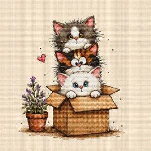 May include: A cross-stitch pattern featuring a stack of three kittens in a brown cardboard box. The top kitten is gray and white, the middle is tortoiseshell, and the bottom is white. A small pink heart and a potted lavender plant are nearby.