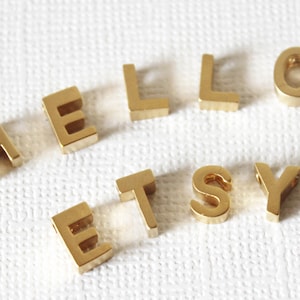 AÑADE una letra extra a tu Pulsera o Collar personalizado