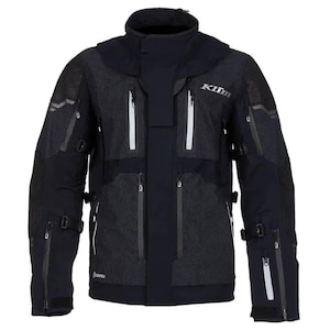 May include: A black and dark gray motorcycle jacket featuring the Klim logo on the chest, a high collar, multiple zippered pockets with light gray accents, adjustable straps on the sleeves, and Gore-Tex branding on the lower front panel.