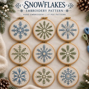May include: A collection of nine circular wooden embroidery hoops featuring various snowflake designs stitched in blue, green, and white thread on light fabric. The text SNOWFLAKES EMBROIDERY PATTERN HAND EMBROIDERY 17 PDF PATTERN is displayed at the top.
