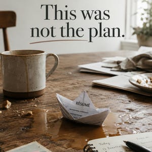 May include: A paper boat folded from a resume sits in a puddle of spilled coffee on a wooden table. Next to it is a ceramic mug, a small plate, and a notebook. The text "This was not the plan." is printed in large black letters above the boat.
