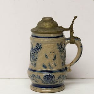 Whites Utica NY Pottery Stoneware Stein Relief Blue Decorated with Pewter Lid