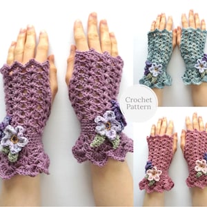 May include: Crochet fingerless gloves with a floral design in purple, pink, and blue. The gloves have a scalloped edge and are shown on hands.