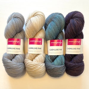 Yarn, Fingering or sock weight yarn, merino wool, cashmere blend yarn. Hand painted sock or fingering yarn. Blue, purple, beige and gray.