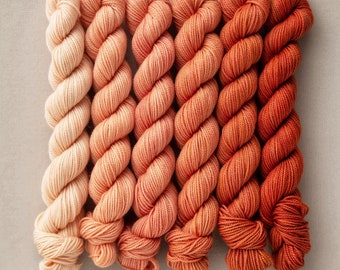 Orange yarn, mini skein yarn, Sweetgeorgia Yarn, Sunkissed Fade colour way of various orange mini skeins of 3 ply sock yarn merino wool