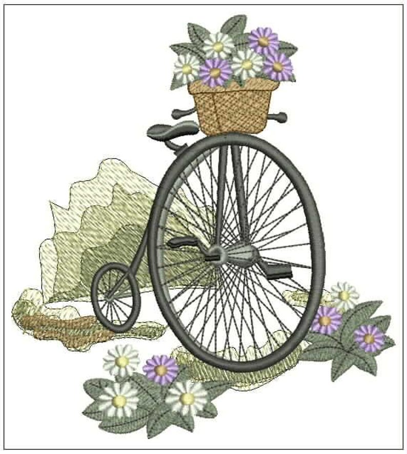May include: An embroidery design featuring a vintage penny-farthing bicycle with a large front wheel and a small rear wheel. A woven basket filled with white and purple flowers sits on the handlebars, surrounded by additional floral clusters.