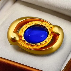 Vintage Satin Gold Tone Oval Brooch With Blue Glass Stone