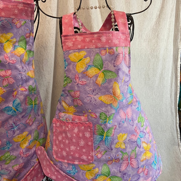 Childs Reversible Apron in Sparkly Pastel Butterflies with sweet pink dots. So Adorable and ready for those Cupcake parties