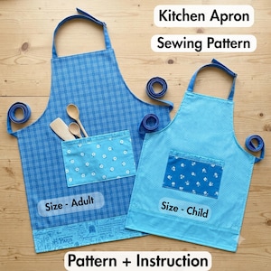 May include: Two blue kitchen aprons, one adult size and one child size, featuring plaid and polka dot patterns with floral pockets. The adult apron includes a wooden spoon and spatula. Text on the image reads Kitchen Apron Sewing Pattern, Size - Adult, Size - Child, and Pattern + Instruction.