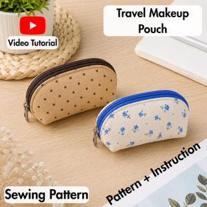 May include: Two semi-circular zippered pouches. One is tan with a brown square pattern and brown zipper. The other is off-white with a blue floral print and blue zipper. Text includes Travel Makeup Pouch, Video Tutorial, and Sewing Pattern.