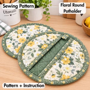 May include: Two round quilted potholders featuring a floral pattern with yellow and white flowers on a cream background, bordered by green fabric with white dots. The front includes a green pocket with a quilted diamond stitch pattern.