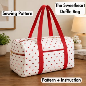 May include: A white duffle bag featuring a repeating pattern of small red hearts, two long red fabric handles, and a gold-toned zip closure. The text "Sewing Pattern", "The Sweetheart Duffle Bag", and "Pattern + Instruction" is visible.